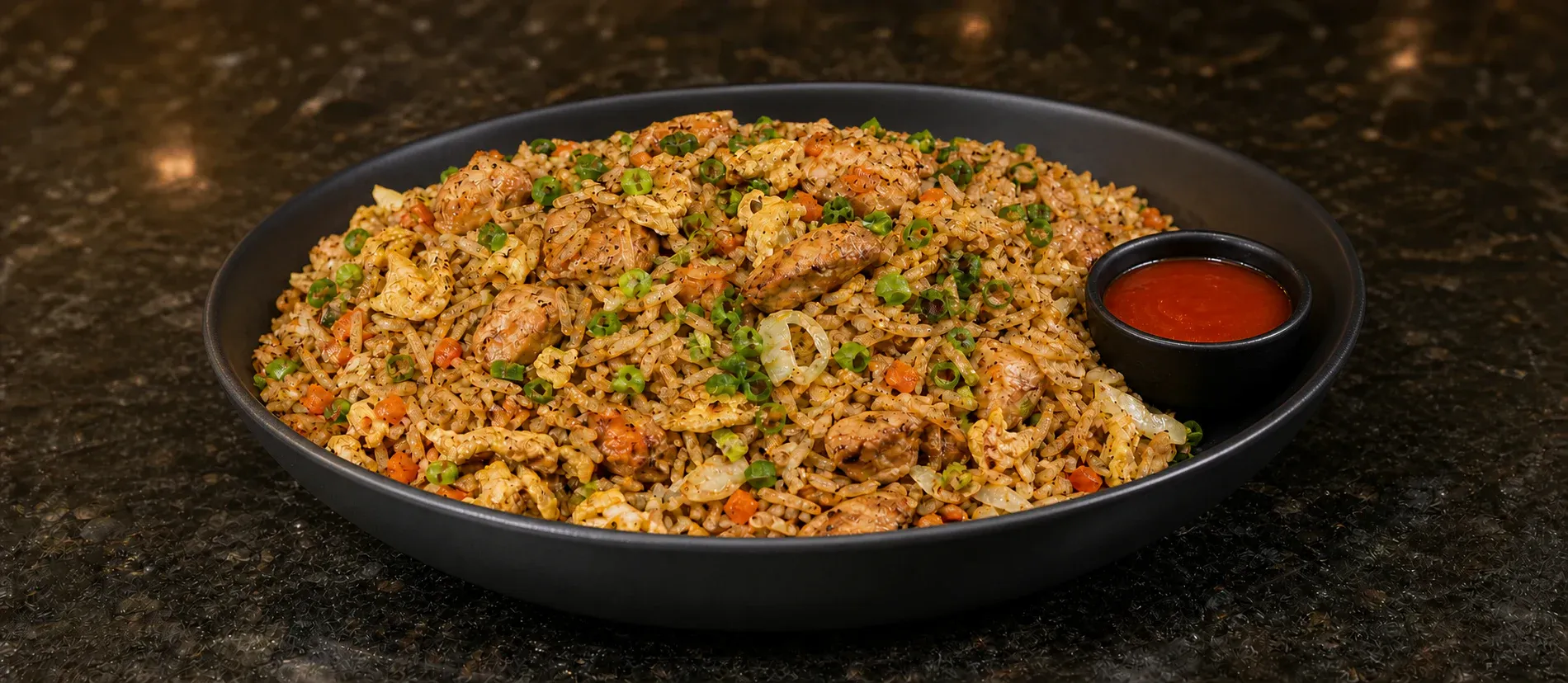Tamil roadside-style chicken fried rice with egg, vegetables, and spring onion