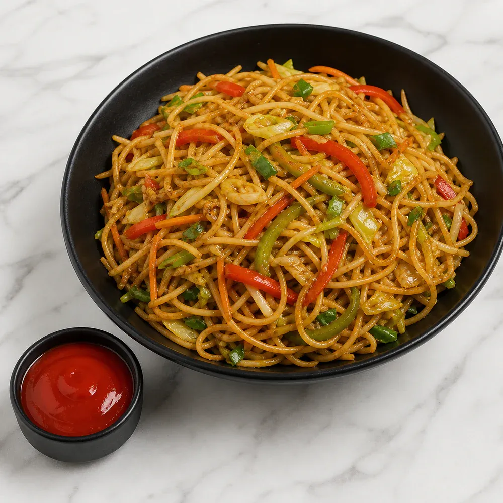 Stir-fried noodles tossed with vegetables and Indo-Chinese sauces.